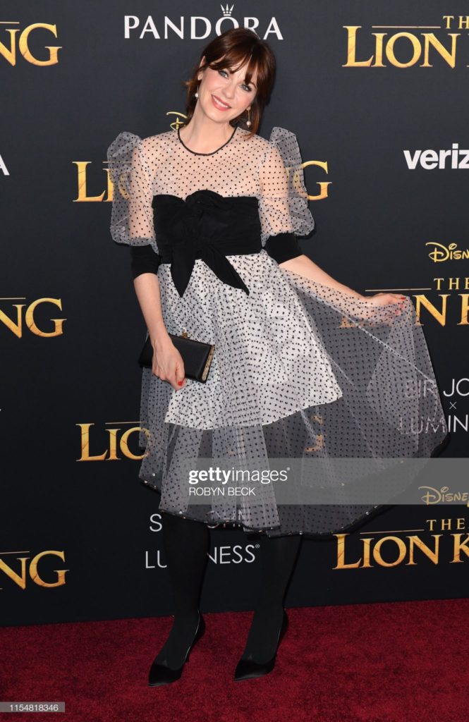 US actress Zooey Deschanel arrives for the world premiere of Disney's "The Lion King" at the Dolby theatre on July 9, 2019 in Hollywood. (Photo by Robyn Beck / AFP) (Photo credit should read ROBYN BECK/AFP via Getty Images)